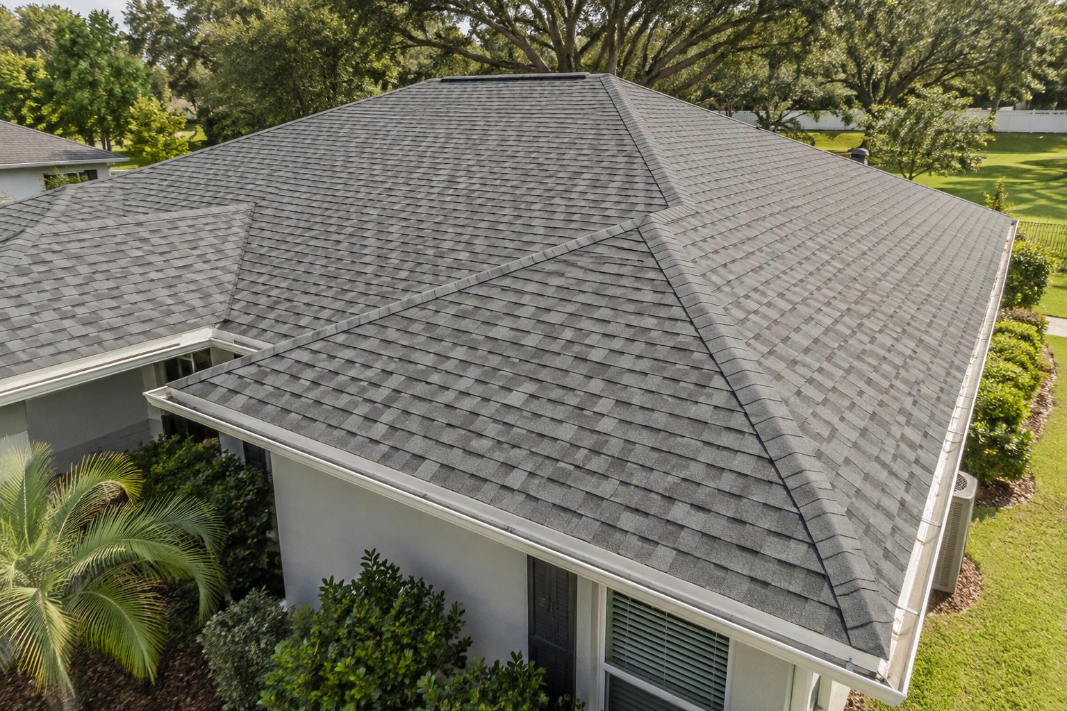 Aerial drone shot of a Florida rooftop with shingles